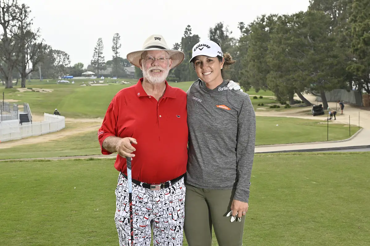 Male and female golfers