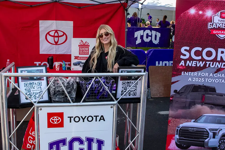 Blonde woman at Toyota Booth